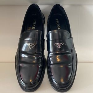 Prada triangle logo black slip on dress shoe